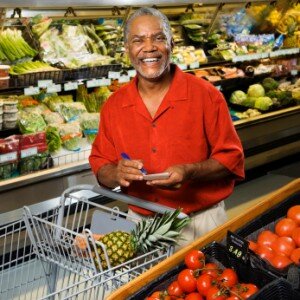 Man grocery shopping.